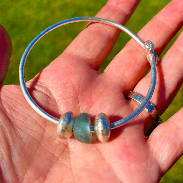 Silver Bangle with silver pebbles and aqua sea glass