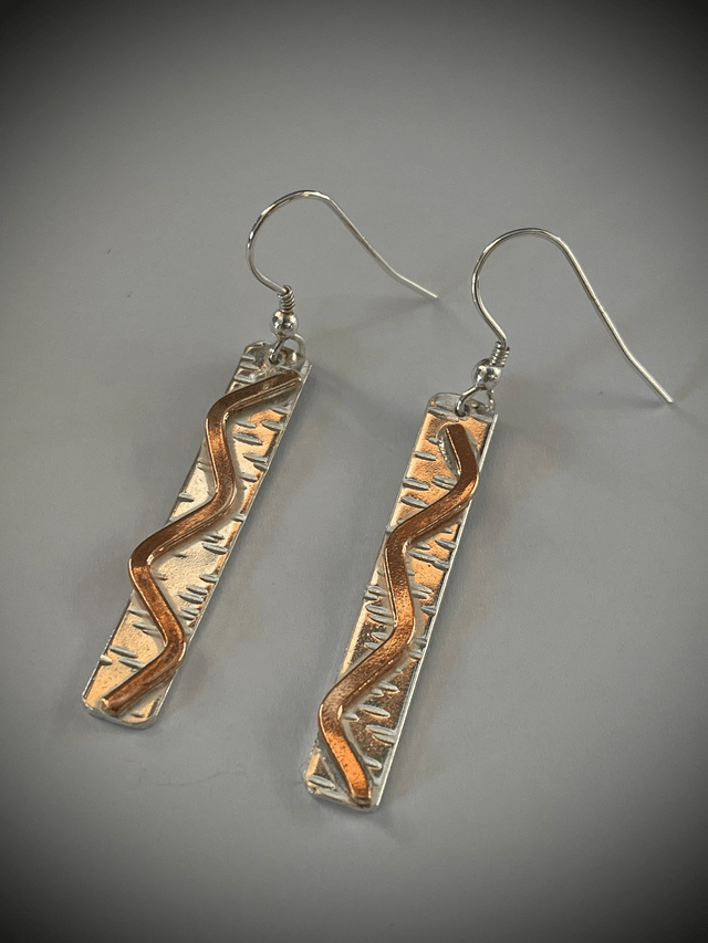 Sterling Silver with Copper Accent.