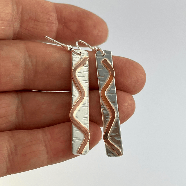 Sterling Silver with Copper Accent.