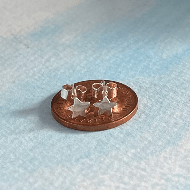 Tiny Silver Star Earring Studs.