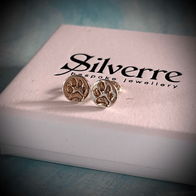 Paw Print Earrings.