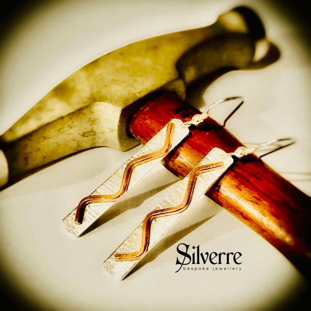 Sterling Silver with Copper Accent.